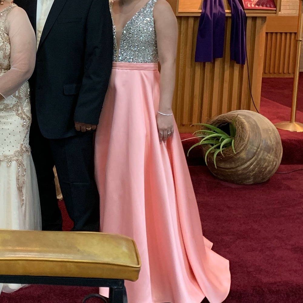 Pink gown with diamonds.